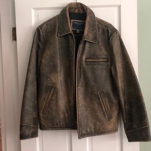 Distressed genuine leather jacket.